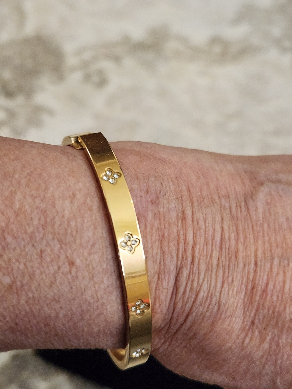 Gold Floral Accent Hinged Bangle Bracelet